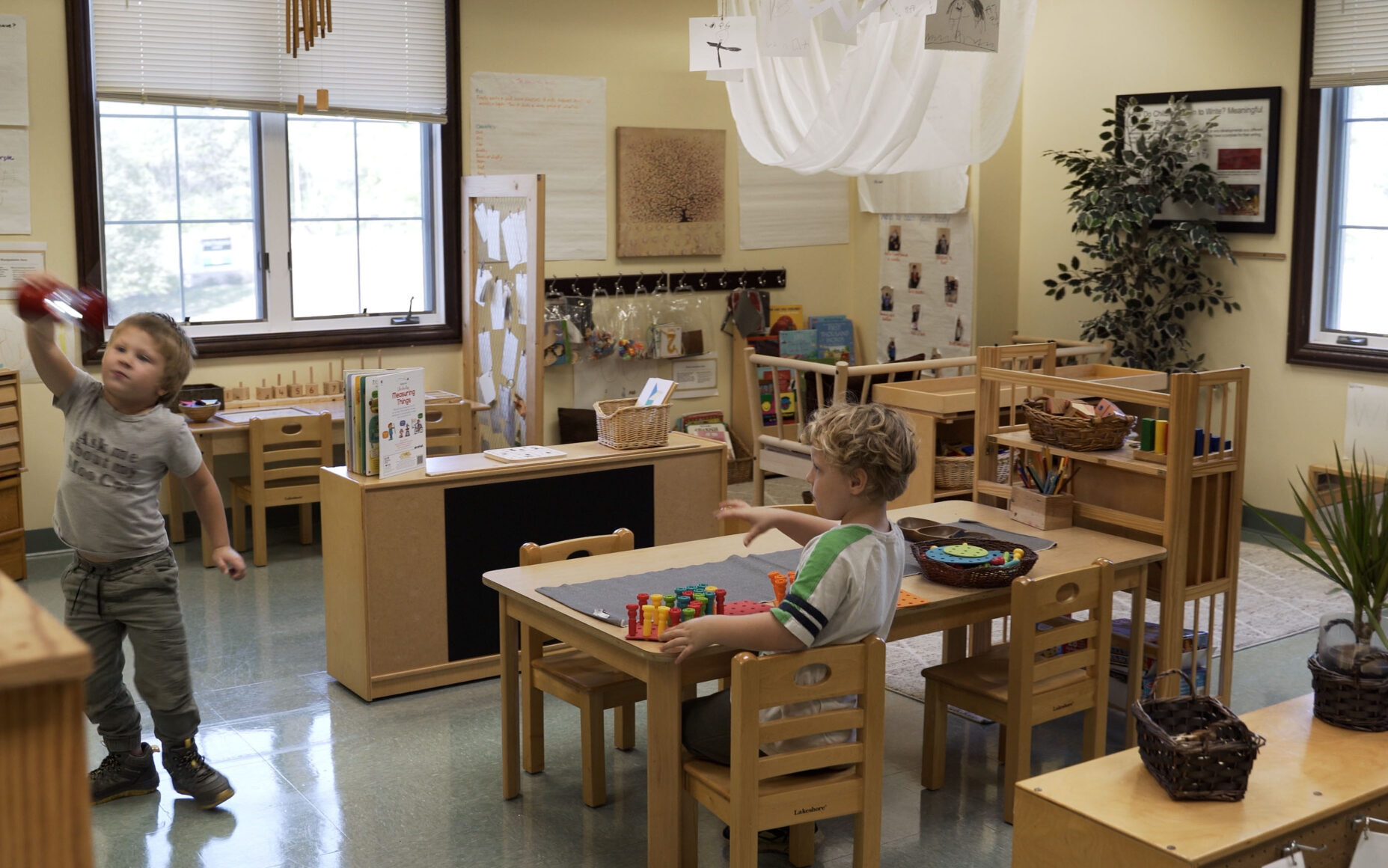 Boys playing in classroom | UPC Discovery